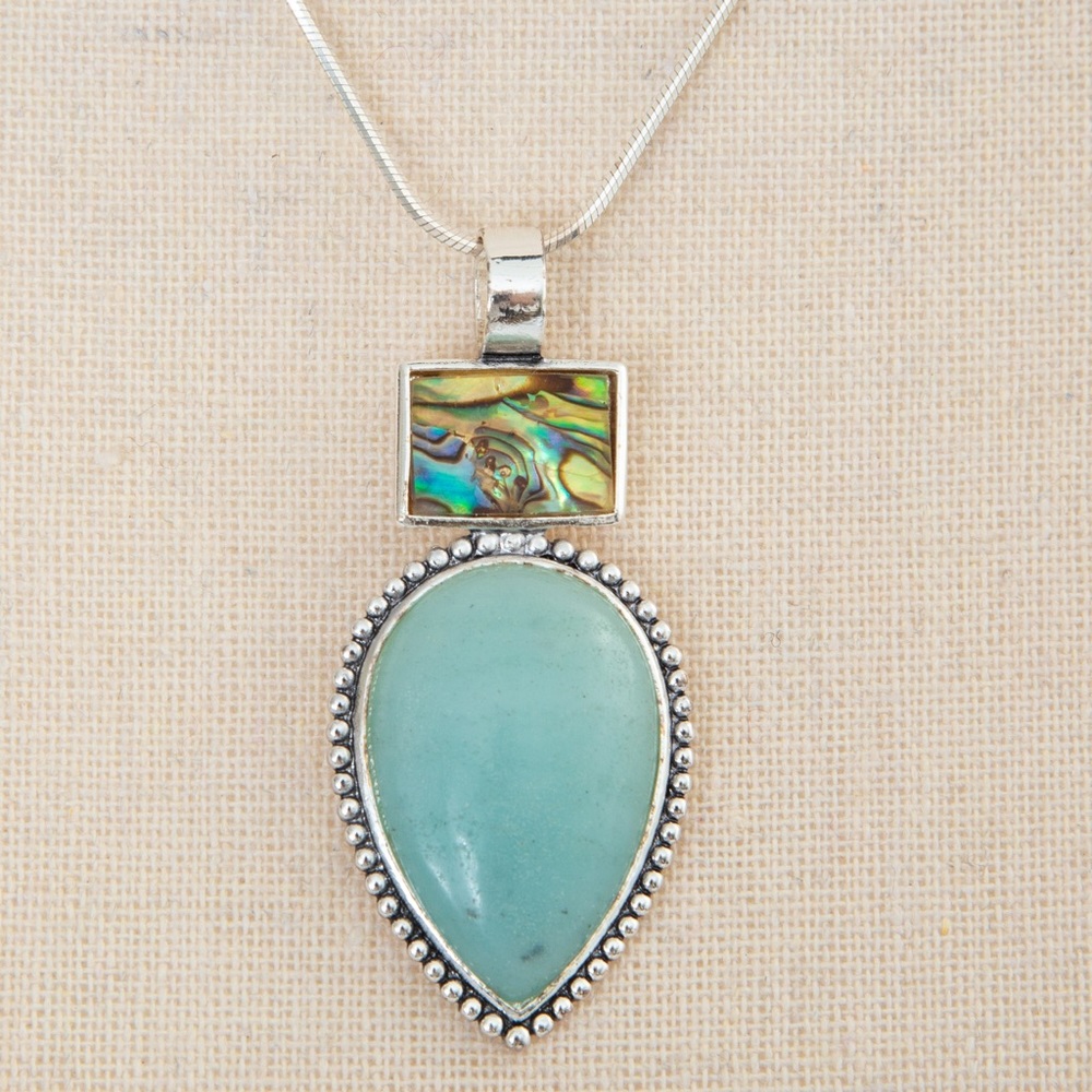 Southwestern pendant turquoise look pear stone, silver look accents Roman stamp - Picture 1 of 11